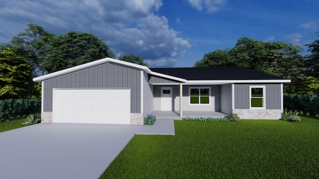 view of front of house with a front yard and a garage