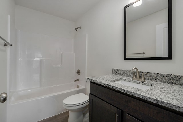 full bathroom featuring wood-type flooring, vanity, toilet, and shower / bathtub combination