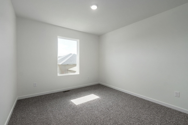 empty room with carpet floors