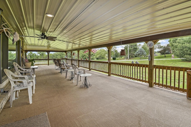 view of patio featuring ceiling fan
