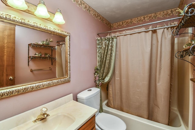 full bath with shower / bath combo with shower curtain, toilet, and vanity