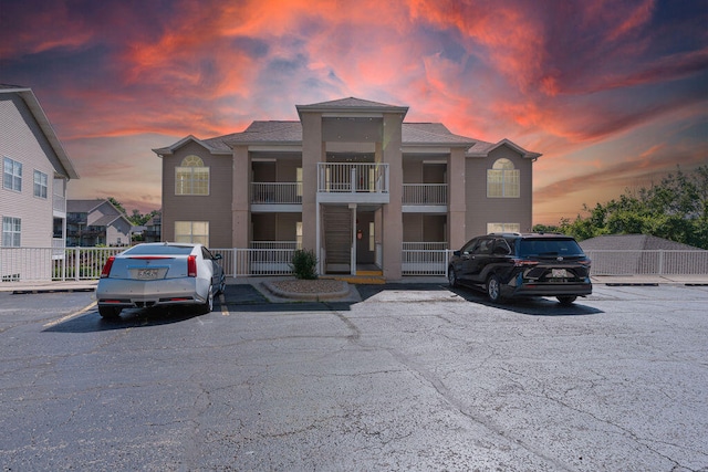 view of outdoor building at dusk