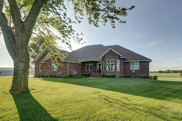 view of front of house with a front lawn