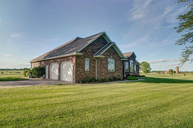 view of home's exterior featuring a lawn and a garage