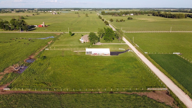 birds eye view of property featuring a rural view