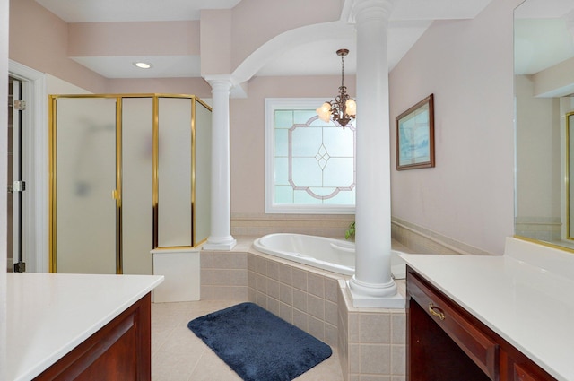 bathroom with vanity, tile patterned flooring, a notable chandelier, and separate shower and tub