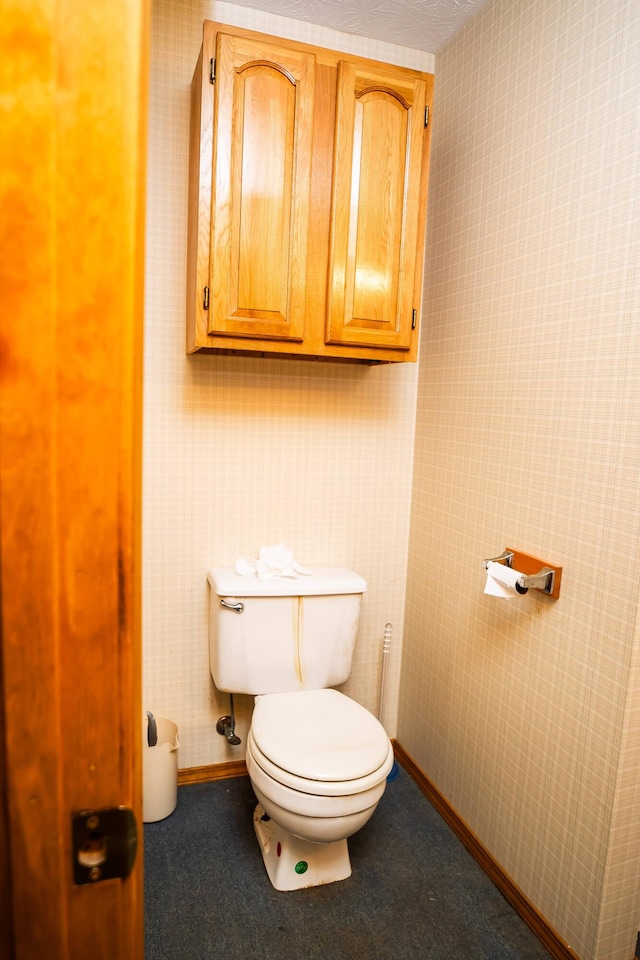 bathroom featuring toilet