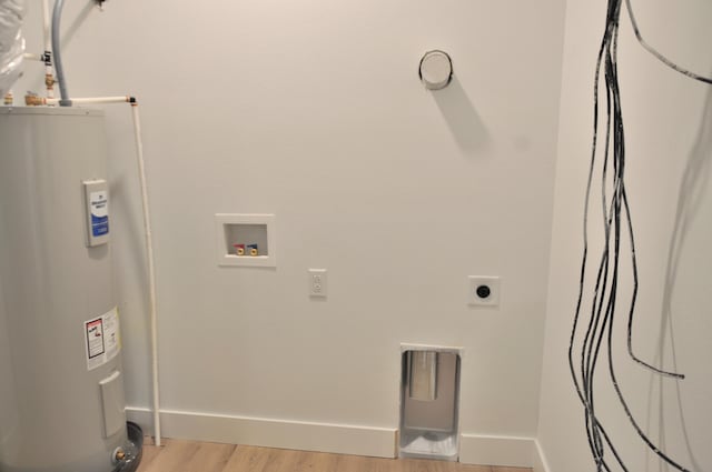 laundry room with washer hookup, hookup for an electric dryer, water heater, and light wood-type flooring