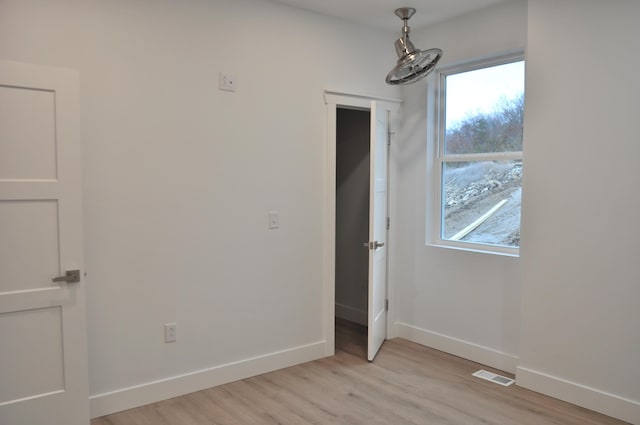 unfurnished bedroom featuring light hardwood / wood-style flooring