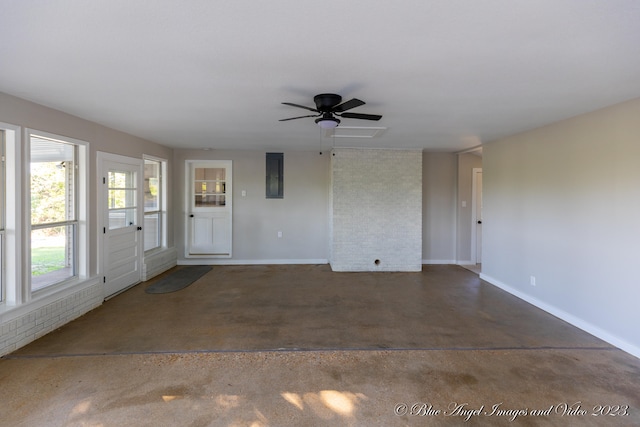 interior space with electric panel and ceiling fan