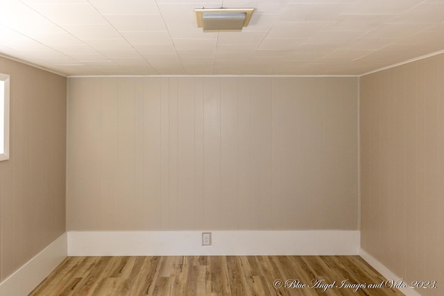 empty room with wood finished floors
