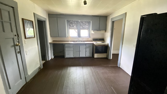 kitchen with gray cabinets, white electric range, sink, and dark hardwood / wood-style flooring