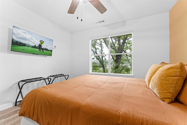 bedroom featuring ceiling fan and light hardwood / wood-style floors