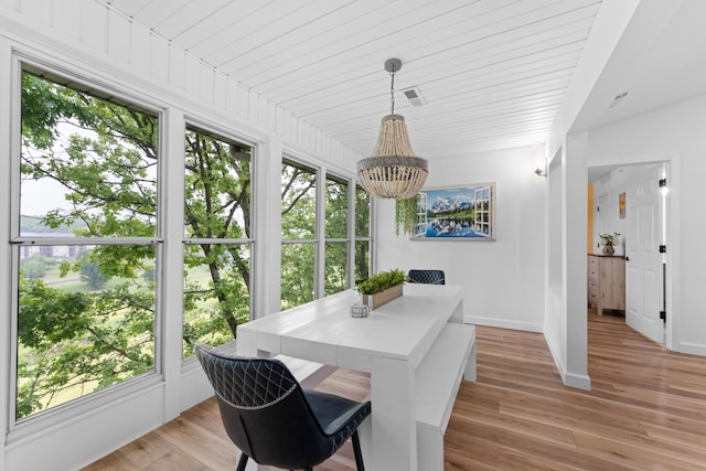 sunroom with wood ceiling