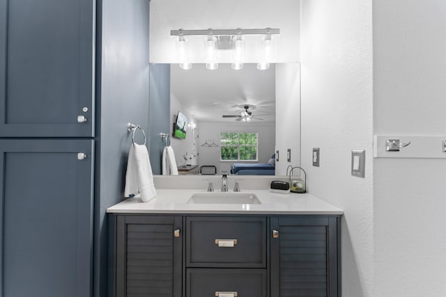 bathroom featuring vanity and ceiling fan