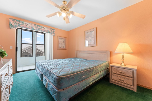 bedroom featuring dark colored carpet, ceiling fan, and access to exterior