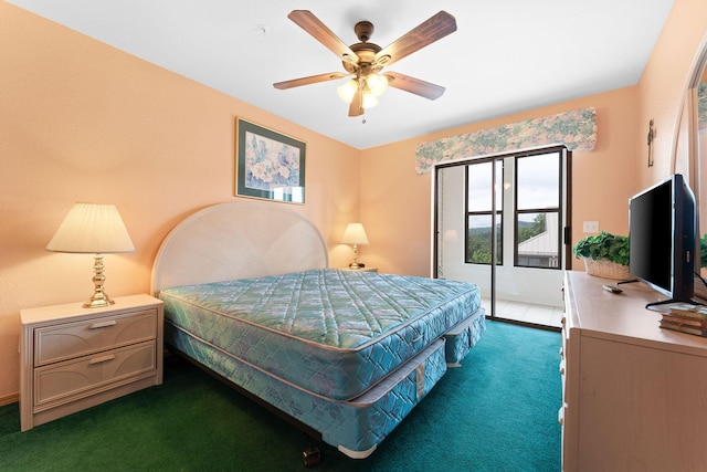 bedroom with dark colored carpet and ceiling fan