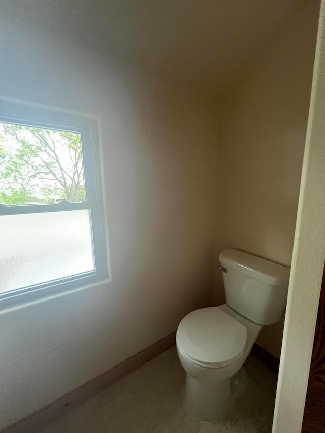 bathroom featuring toilet