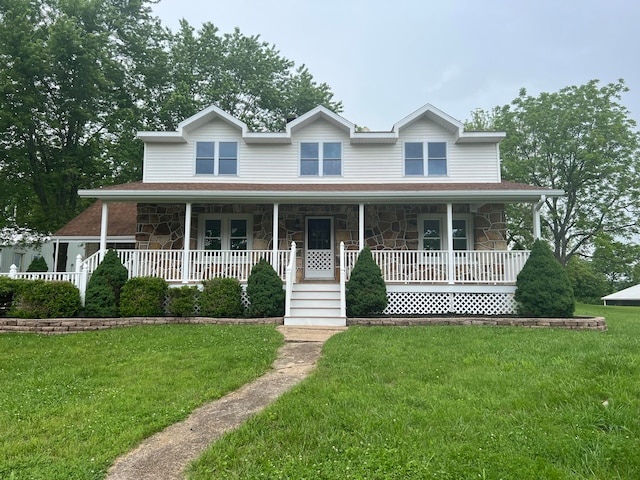 view of front facade with a porch and a front lawn