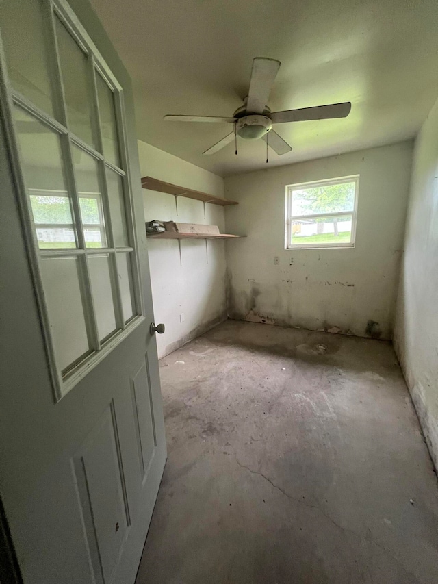 unfurnished room with ceiling fan