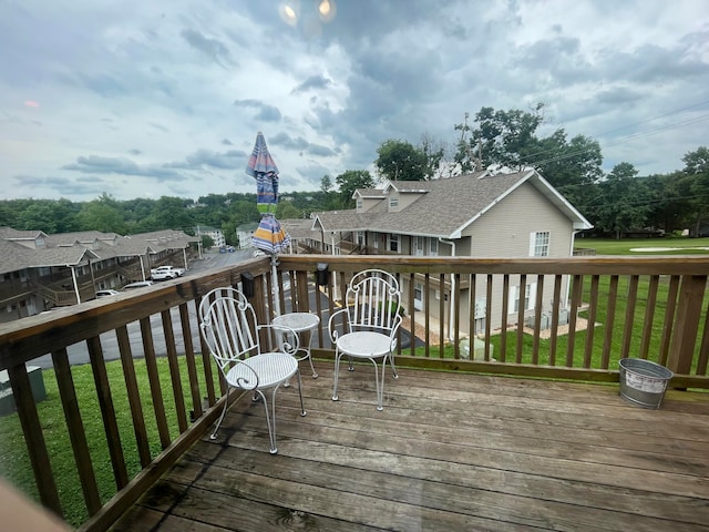 deck featuring a yard