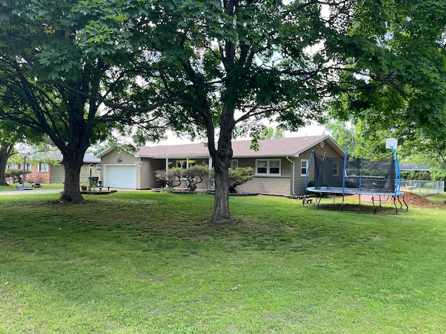 view of yard with a trampoline