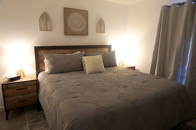 bedroom featuring wood-type flooring