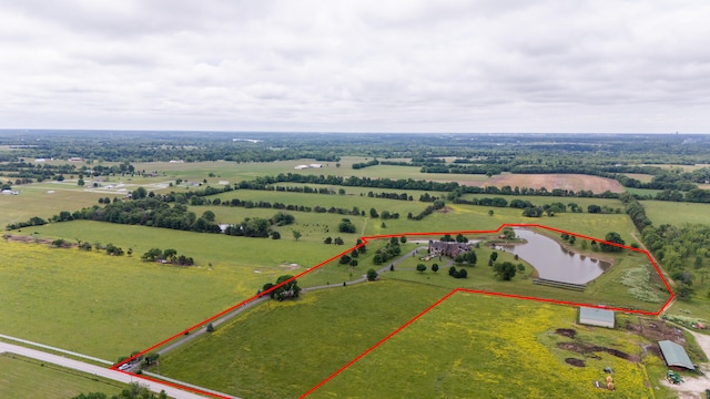 aerial view featuring a water view and a rural view