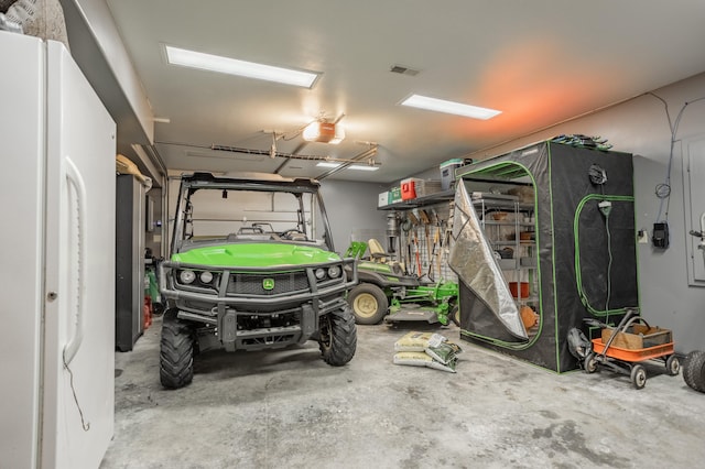 garage featuring a garage door opener