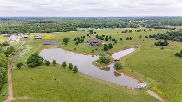 aerial view with a water view and a rural view