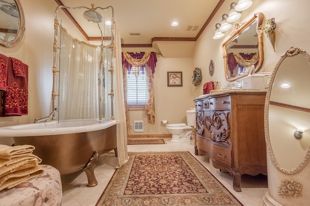 bathroom featuring ornamental molding, tile patterned floors, toilet, and independent shower and bath