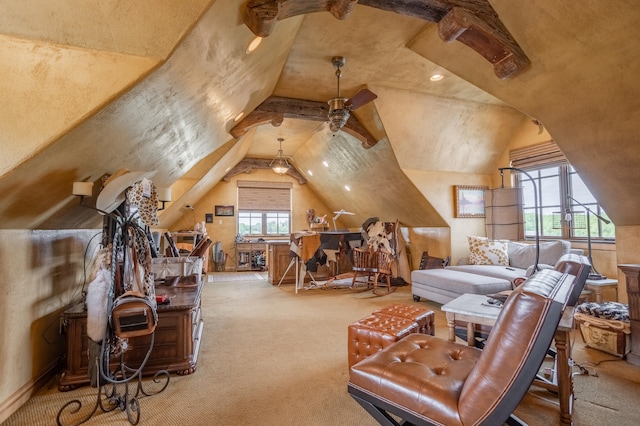 interior space with carpet floors, vaulted ceiling, and ceiling fan