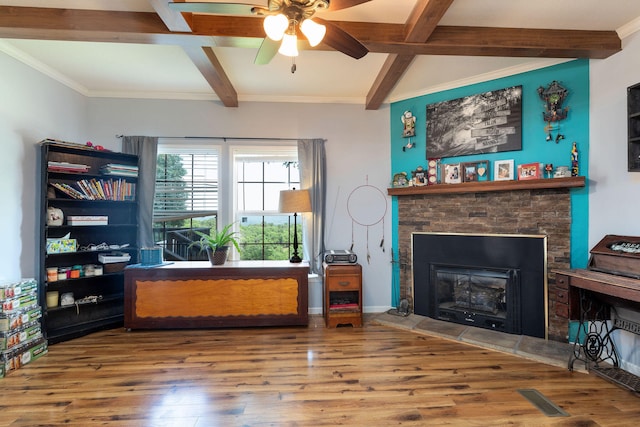 interior space featuring wood-type flooring, beamed ceiling, and ornamental molding