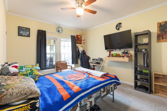 carpeted bedroom with ceiling fan and ornamental molding