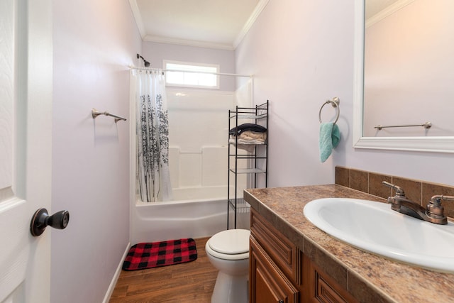 full bathroom featuring shower / tub combo with curtain, vanity, hardwood / wood-style flooring, crown molding, and toilet