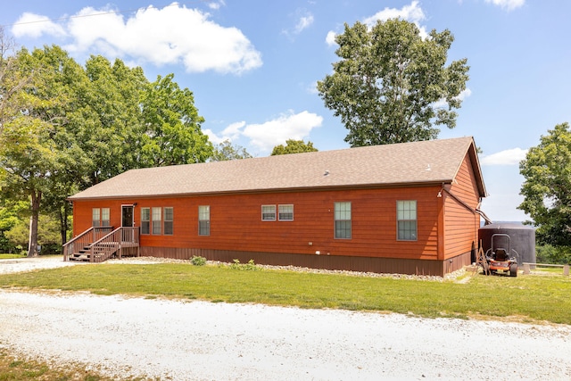 view of front of home with a front yard