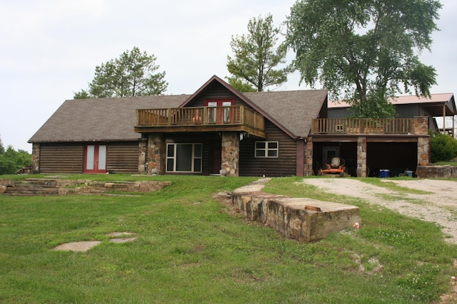 20949 Needles Eye Rd, Shell Knob, MO 65747 - view of front of property featuring a front lawn, driveway, a wooden deck, and stone siding