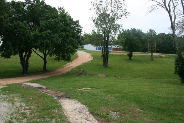 20949 Needles Eye Rd, Shell Knob, MO 65747 - view of property's community with a lawn and driveway
