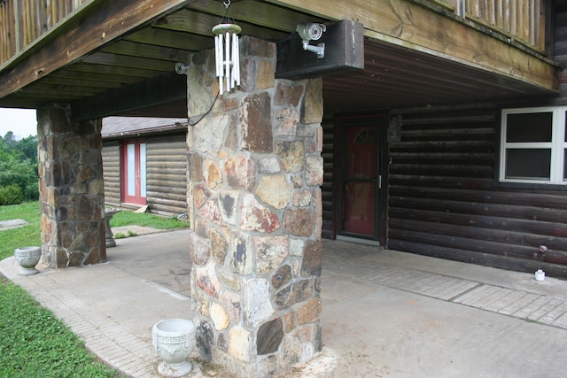 20949 Needles Eye Rd, Shell Knob, MO 65747 - exterior space featuring a patio area and stone siding