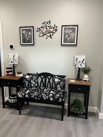 20949 Needles Eye Rd, Shell Knob, MO 65747 - sitting room with baseboards and wood finished floors