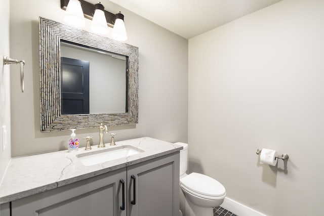 5233 S Stirling Way, Springfield, MO 65809 - bathroom featuring tile patterned flooring, toilet, vanity, and baseboards