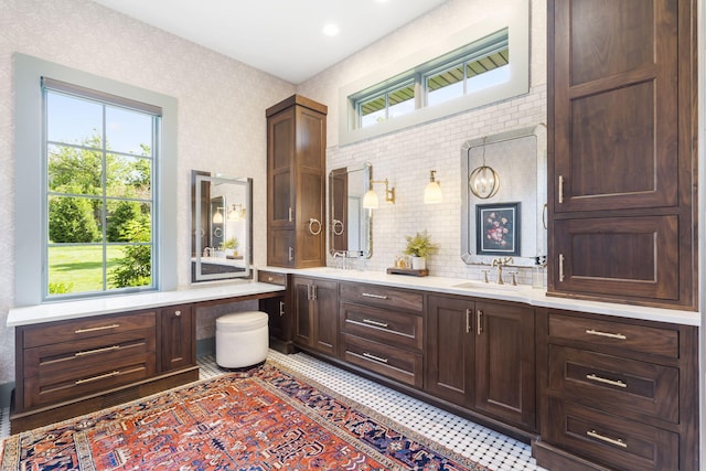 5233 S Stirling Way, Springfield, MO 65809 - bathroom featuring a wealth of natural light, tasteful backsplash, and vanity