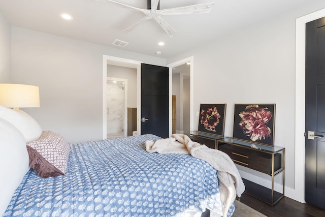 bedroom with dark wood-type flooring, connected bathroom, and ceiling fan