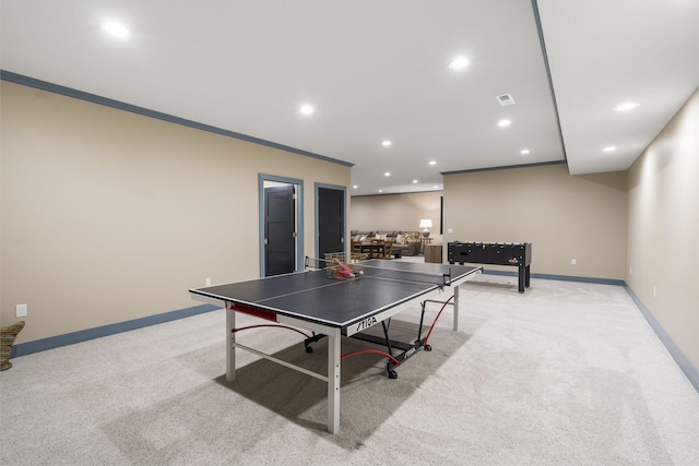 playroom featuring light carpet and ornamental molding