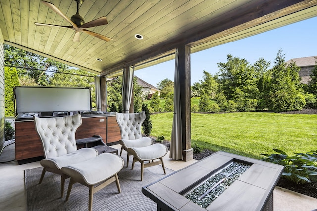 view of patio featuring ceiling fan