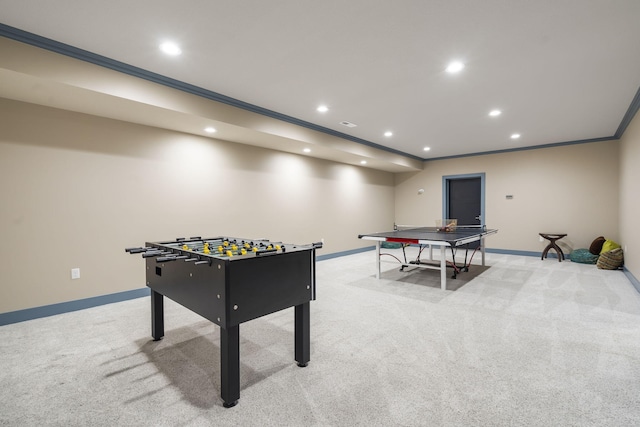 recreation room with light carpet and ornamental molding