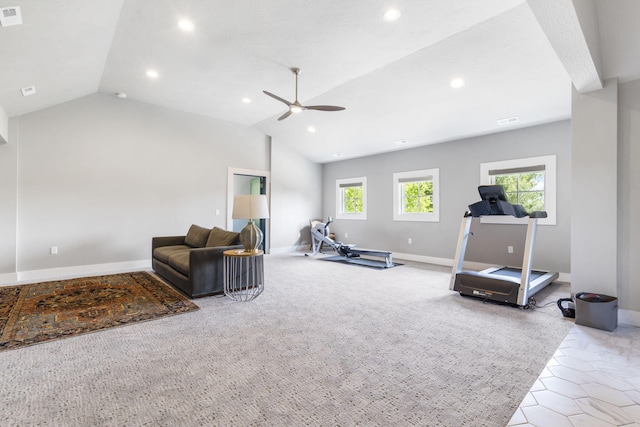 exercise room featuring light carpet, vaulted ceiling, and ceiling fan