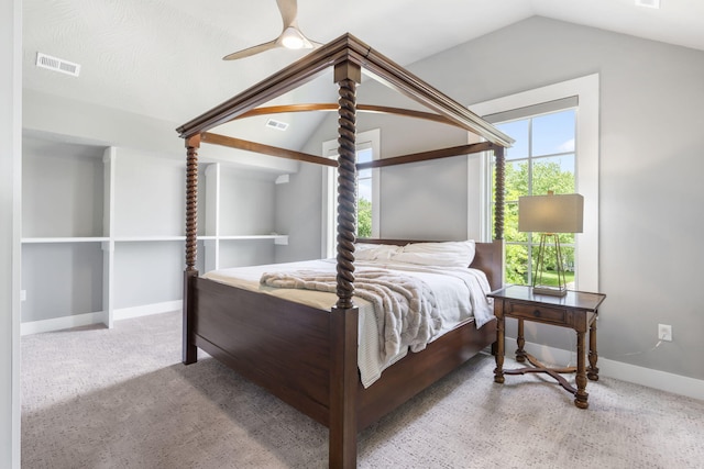 bedroom featuring lofted ceiling, carpet flooring, and ceiling fan