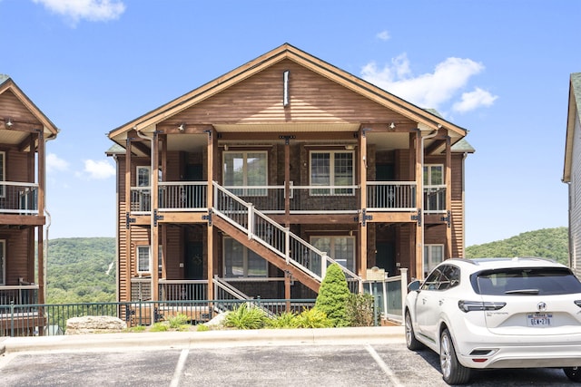 exterior space featuring ceiling fan and a porch