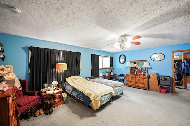 4587 E Farm Road 136, Springfield, MO 65809 - carpeted bedroom featuring a ceiling fan and a textured ceiling